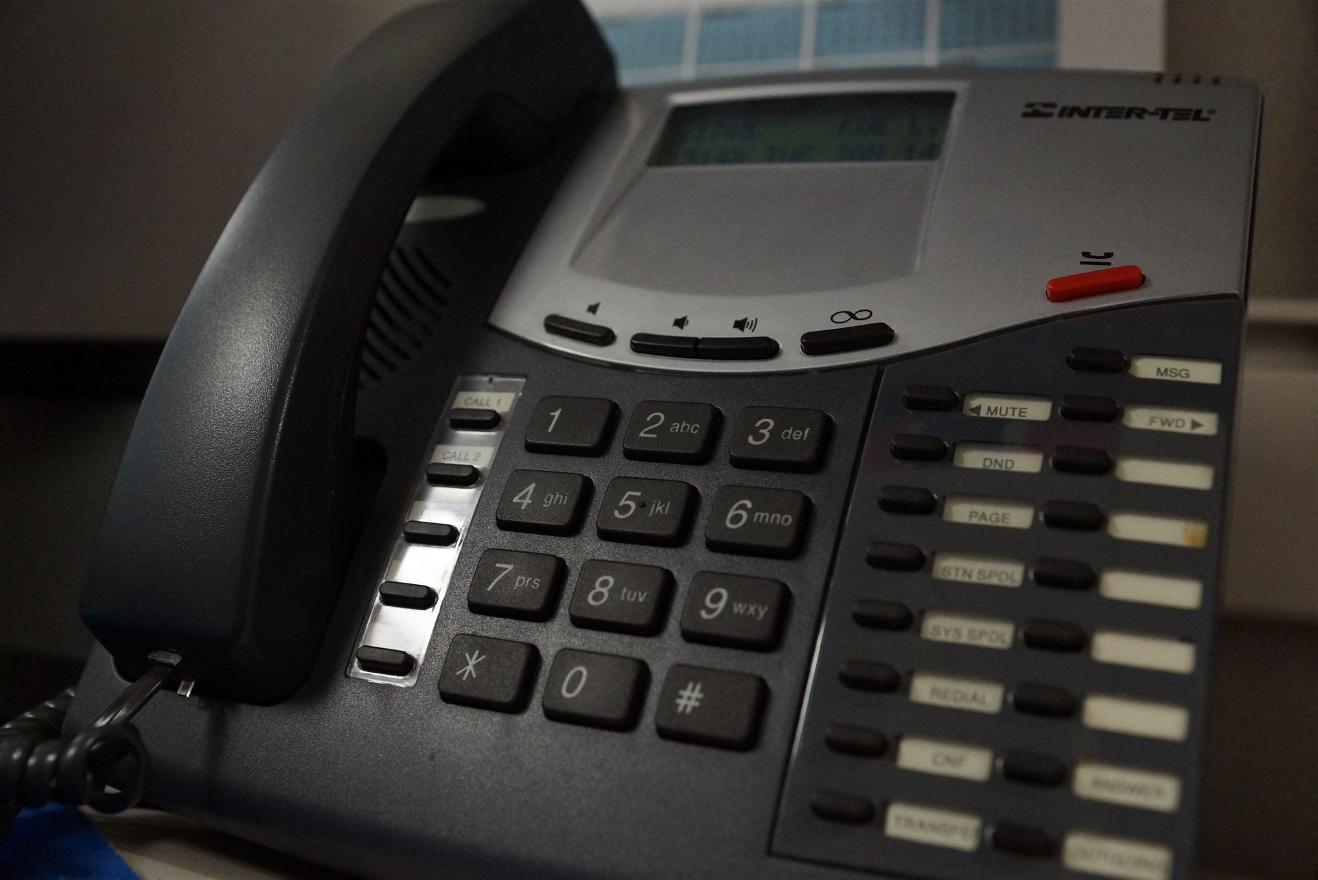 Business desk phone in an office